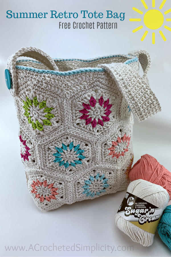 Crochet hexagon tote bag in cream and bright colors shown with cotton yarn.