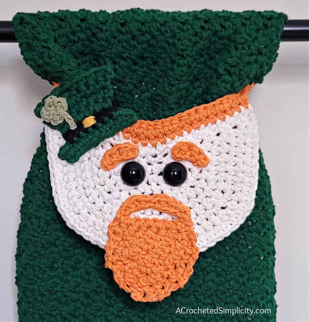 Close up of crochet leprechaun face.