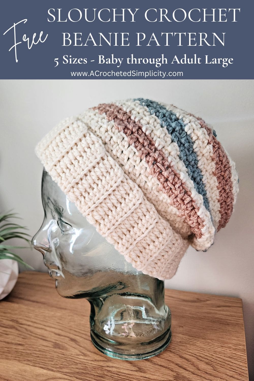 Crochet beanie on a glass mannequin head.