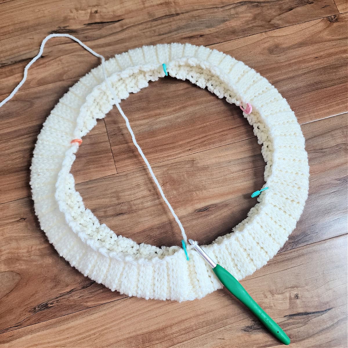 Crochet ribbing folded in half lengthwise to create a channel for the crochet rope to go through.