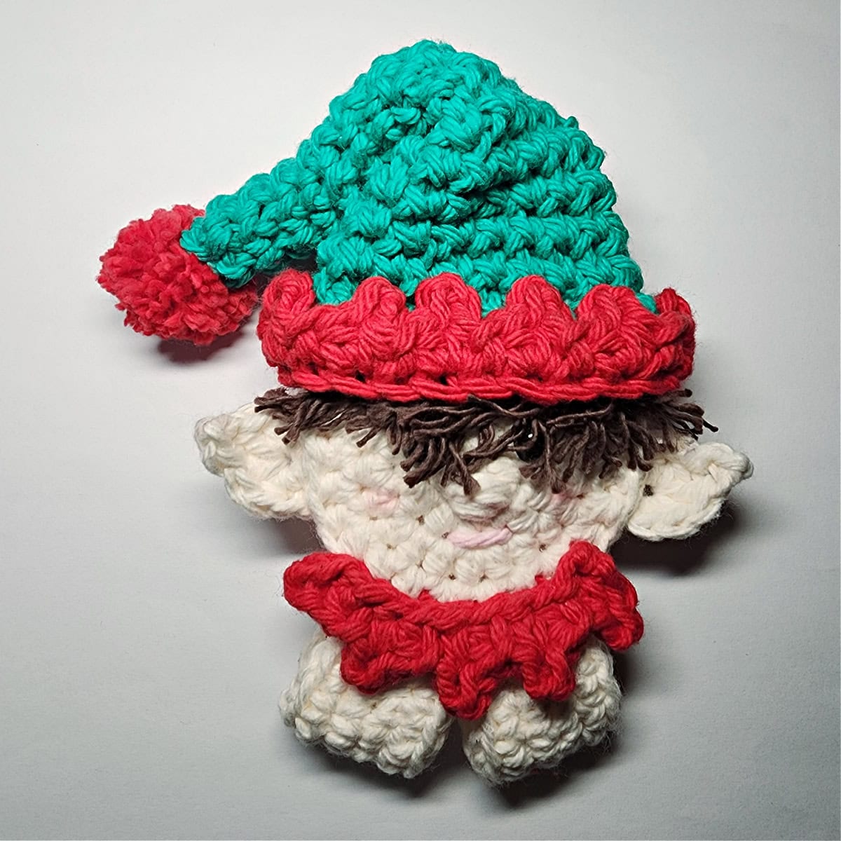 Crochet elf ornament almost all assembled.