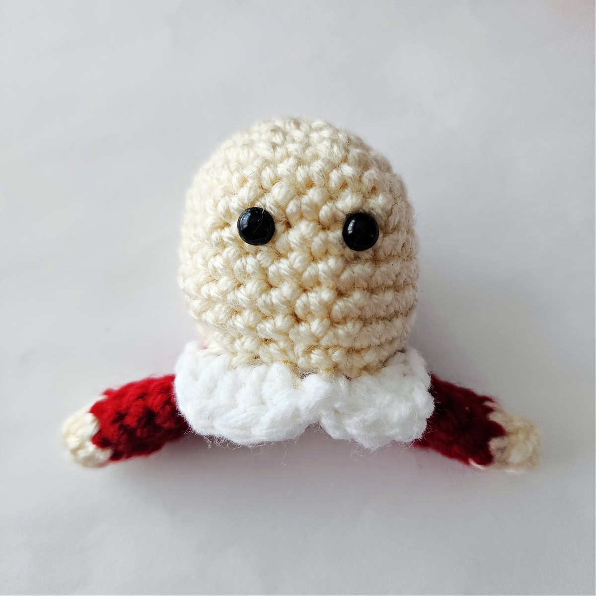 How to attach safety eyes on a crochet amigurumi Mrs Claus.