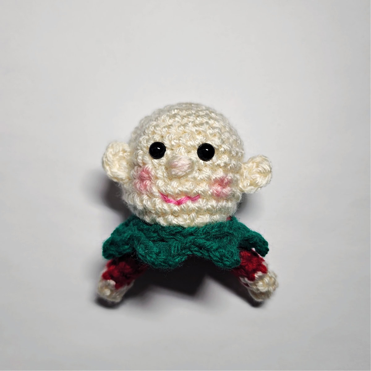 How to attach ears to a crochet elf amigurumi.