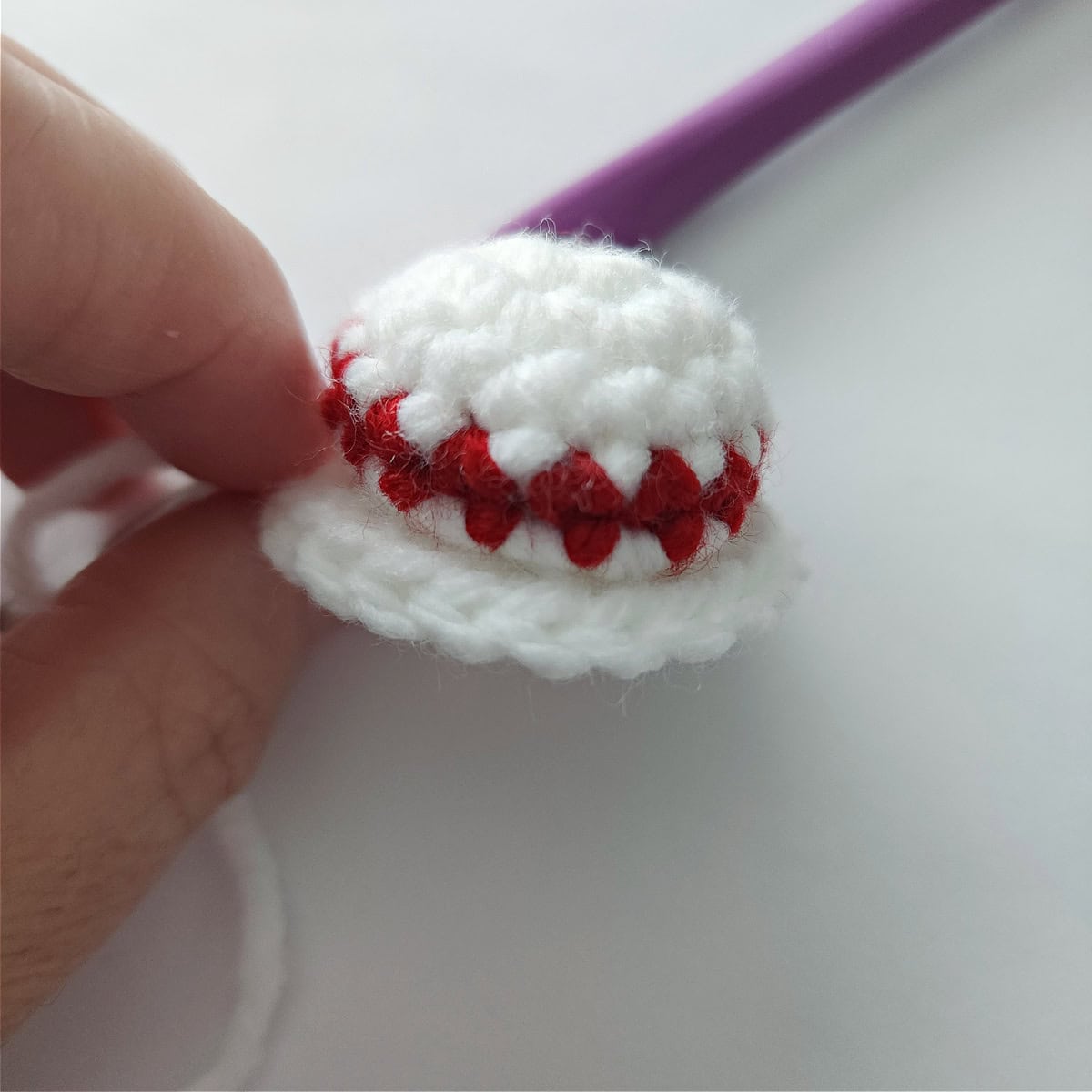 A side view of the cute crochet bun for Mrs Claus's hair.