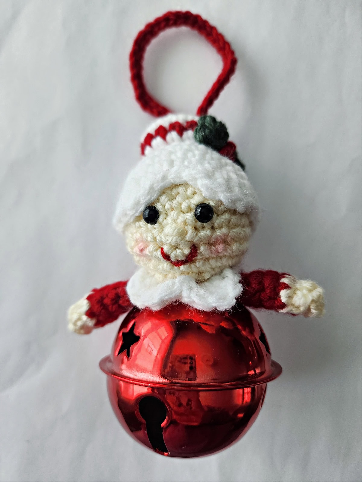 Cute Mrs Claus crochet jingle bell ornament.