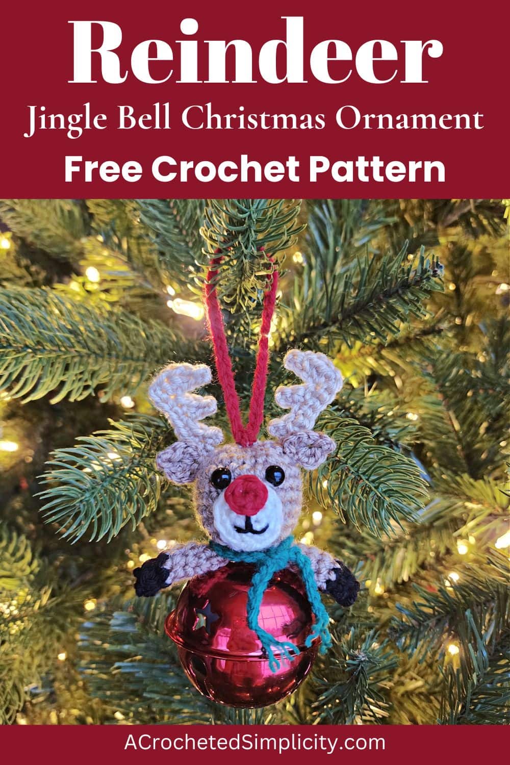 Reindeer jingle bell crochet ornament hanging on a tree with white lights.