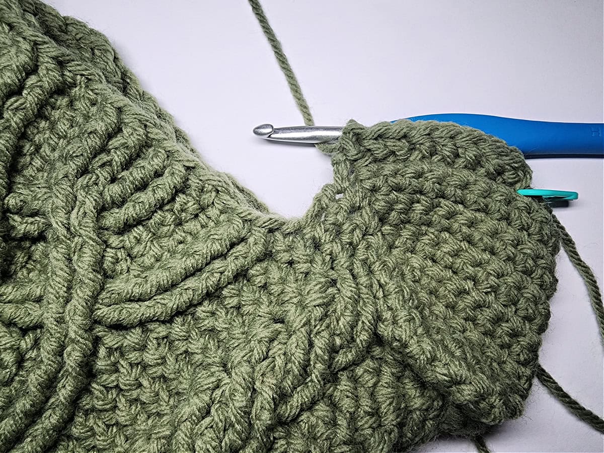 This photo shows how to pick up stitches across the heel of the stocking.