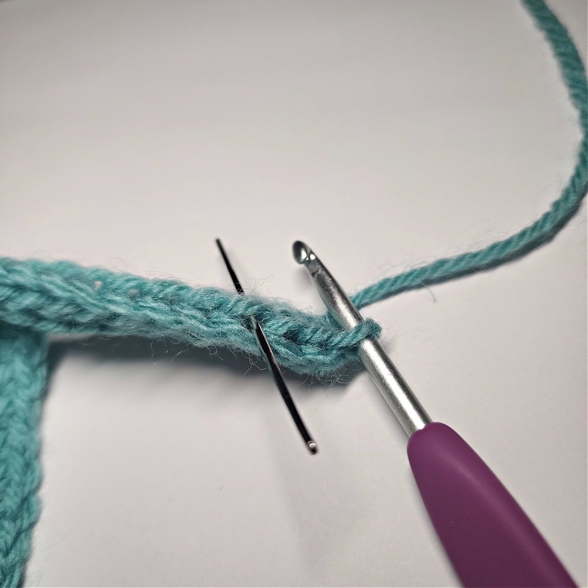 At the beginning of row 3, skip the first stitch.