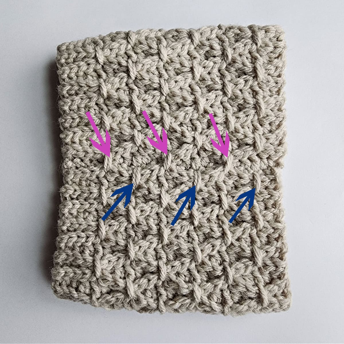 The pink arrows are pointing to the first set of finishing stitches and the blue arrows are pointing to the second set of finishing stitches.